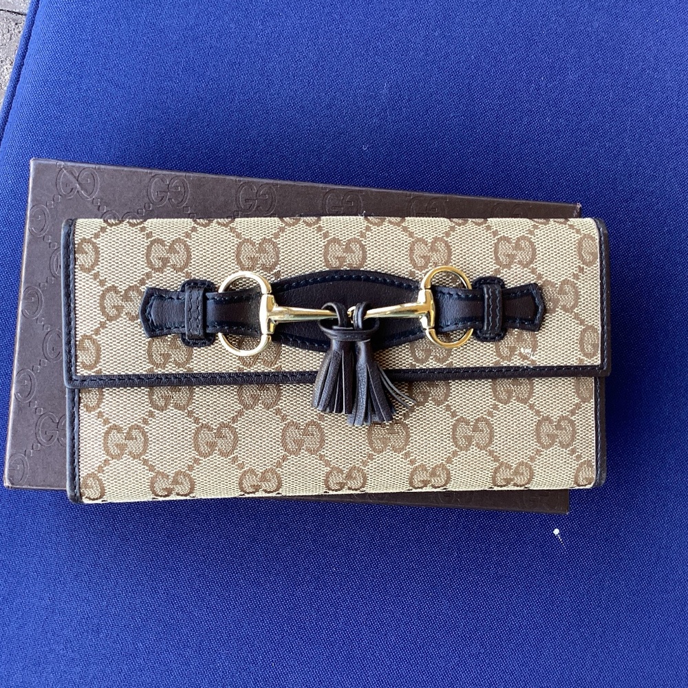 Gucci horsebit bifold long wallet.